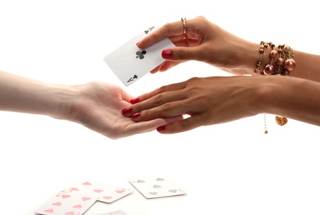 reading the lines hand in a woman's hands isolated on whiteの写真素材