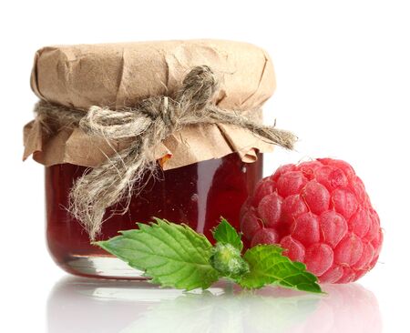 jar with jam and ripe raspberry with mint isolated on whiteの写真素材