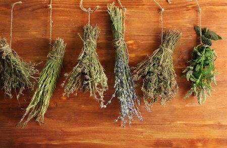 dried herbs, on wooden backgroundの写真素材