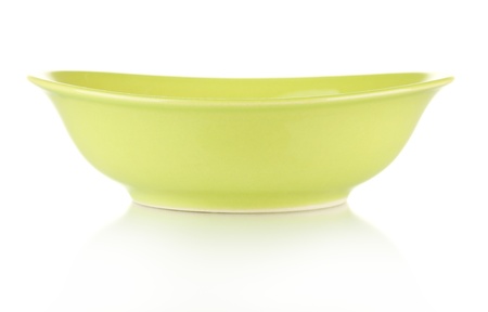 Green empty bowl isolated on whiteの写真素材