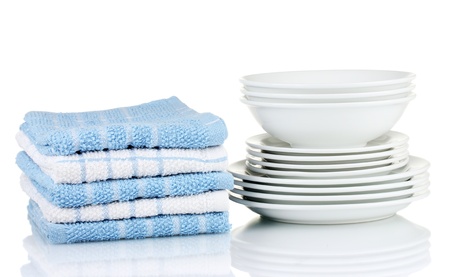 Kitchen towels with dishes isolated on white backgroundの写真素材