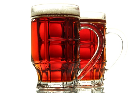 two tankards of kvass, isolated on white