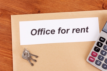 folder with information on the office leasing on wooden backgroundの写真素材