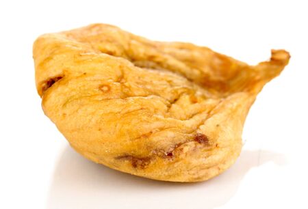 delicious dried fig isolated on whiteの写真素材