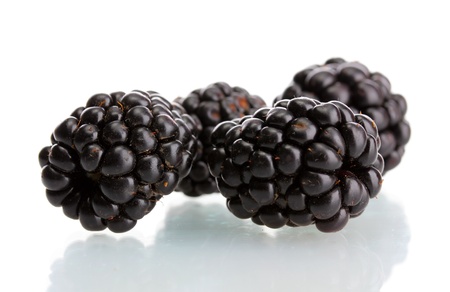 beautiful blackberries isolated on whiteの写真素材