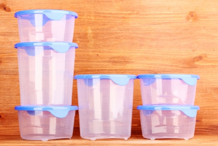 Plastic containers for food on wooden backgroundの写真素材