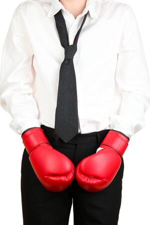 businessman in boxing gloves isolated on whiteの写真素材
