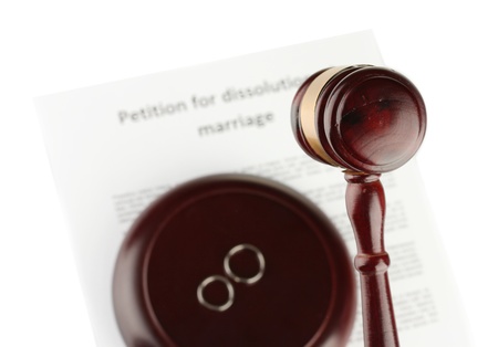 Divorce decree and wooden gavel on white backgroundの写真素材