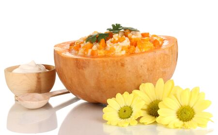 Useful pumpkin porridge in pumpkin isolated on whiteの写真素材