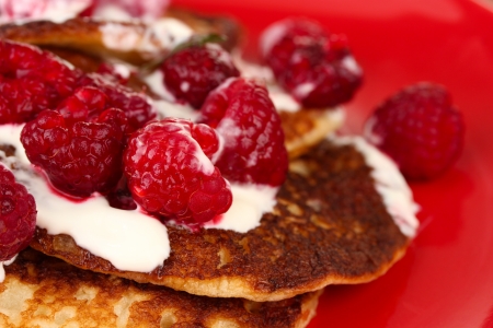 pancakes with raspberry and cream backgroundの写真素材