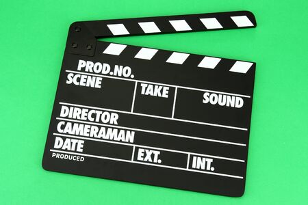 Movie production clapper board on color backgroundの写真素材