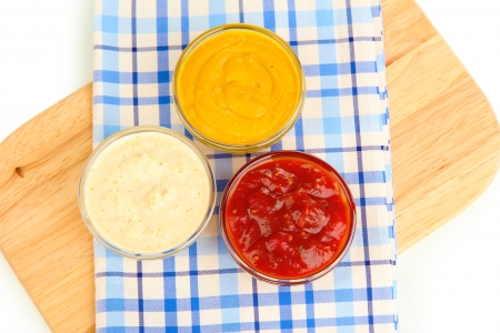 various sauces on chopping board close-upの写真素材