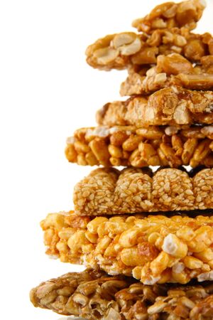 tasty sweets (kozinaki), isolated on whiteの写真素材