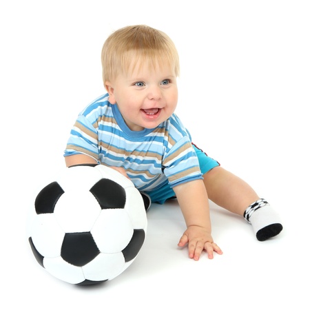 Little boy playing with soccer-ball, isolated on white
の写真素材