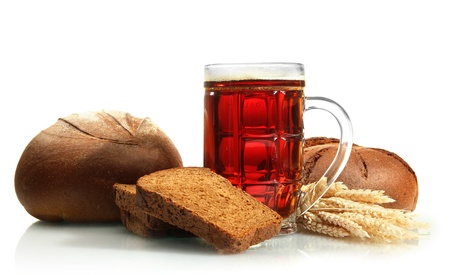 tankard of kvass and rye breads with ears, isolated on whiteの写真素材