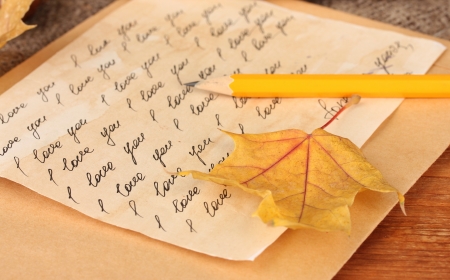 autumn background:romantic letter and leavesの写真素材