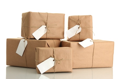 parcels boxes with kraft paper, isolated on whiteの写真素材