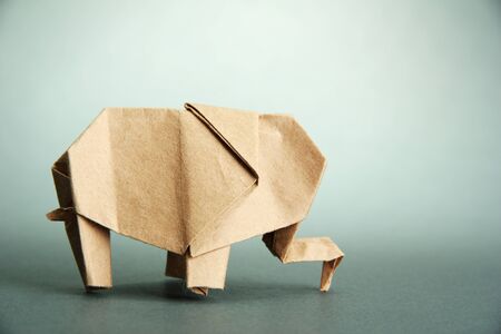 Origami elephant, on grey backgroundの写真素材