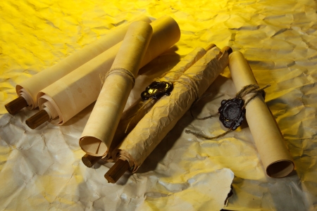 Old scrolls, on brown paper backgroundの写真素材