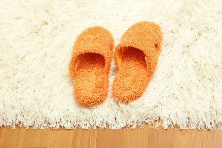 bright slippers, on floor backgroundの写真素材