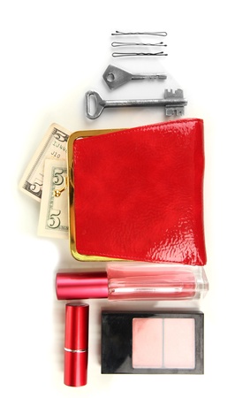 Items contained in the women's handbag isolated on whiteの写真素材