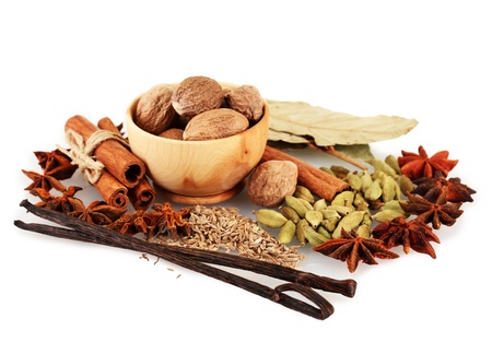 Nutmeg and other spices isolated on whiteの写真素材