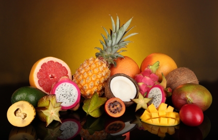 Composition of exotic fruits on colorful backgroundの写真素材