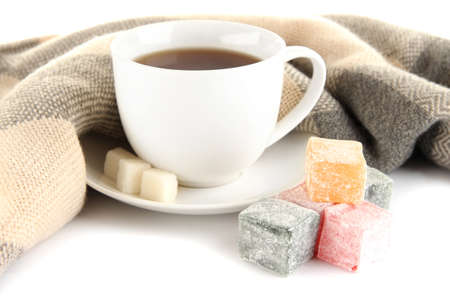 cup of tea with scarf isolated on whiteの写真素材