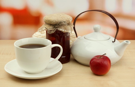 light breakfast with tea and homemade jam, on wooden tableの写真素材