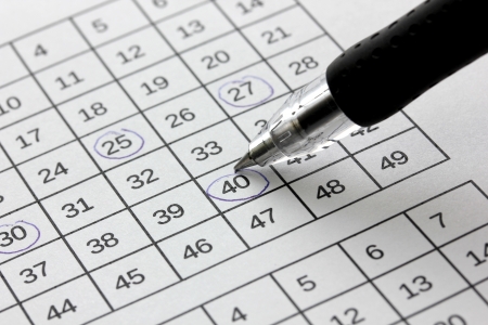 Lottery ticket and pen, close upの写真素材