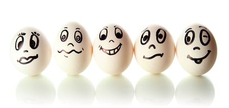 Eggs with funny faces isolated on whiteの写真素材