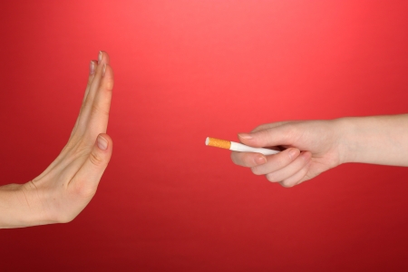 Concept: stop smoking, on red backgroundの写真素材