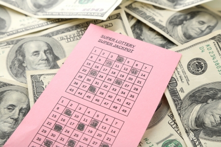 Lottery ticket and money, close upの写真素材