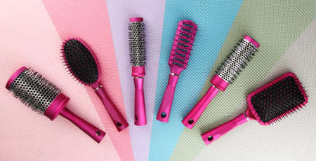 Comb brushes on bright backgroundの写真素材