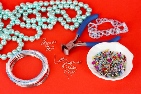 Set for needlework on red background