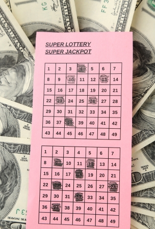 Lottery ticket and money, close upの写真素材