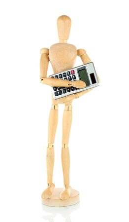Wooden mannequin with calculator isolated on whiteの写真素材