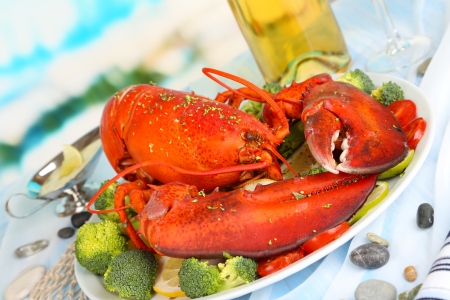 Red lobster on platter on serving table close-upの写真素材