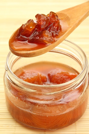 tasty homemade jam, on bamboo matの写真素材