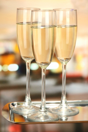 Corporate party: sparkling champagne glasses on trayの写真素材