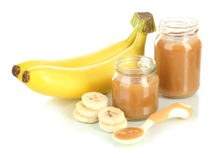 Baby puree with bananas isolated on whiteの写真素材
