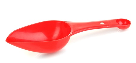Empty measuring cup for washing powder isolated on whiteの写真素材