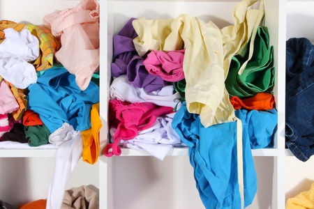 Clothing scattered on shelvesの写真素材