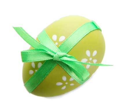 Bright easter egg with bow, isolated on whiteの写真素材