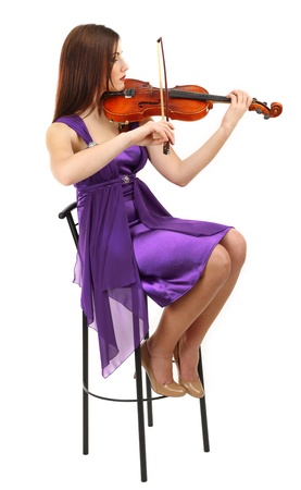 Beautiful young girl with violin, isolated on whiteの写真素材