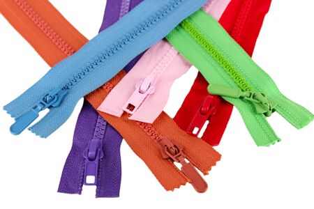 Multicolored zippers isolated on whiteの写真素材