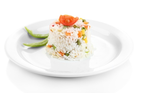 Delicious risotto with vegetables, isolated on whiteの写真素材