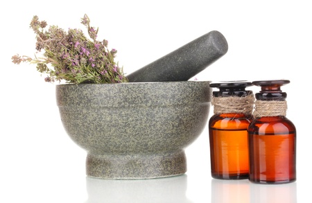 Thyme herb and mortar isolated on white