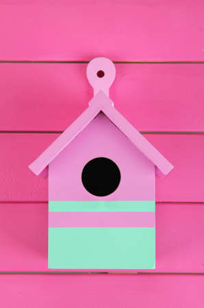 Decorative nesting box on color wooden backgroundの写真素材