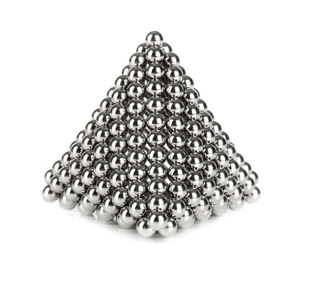 Pyramid of metal balls for neocube (toy), isolated on whiteの写真素材